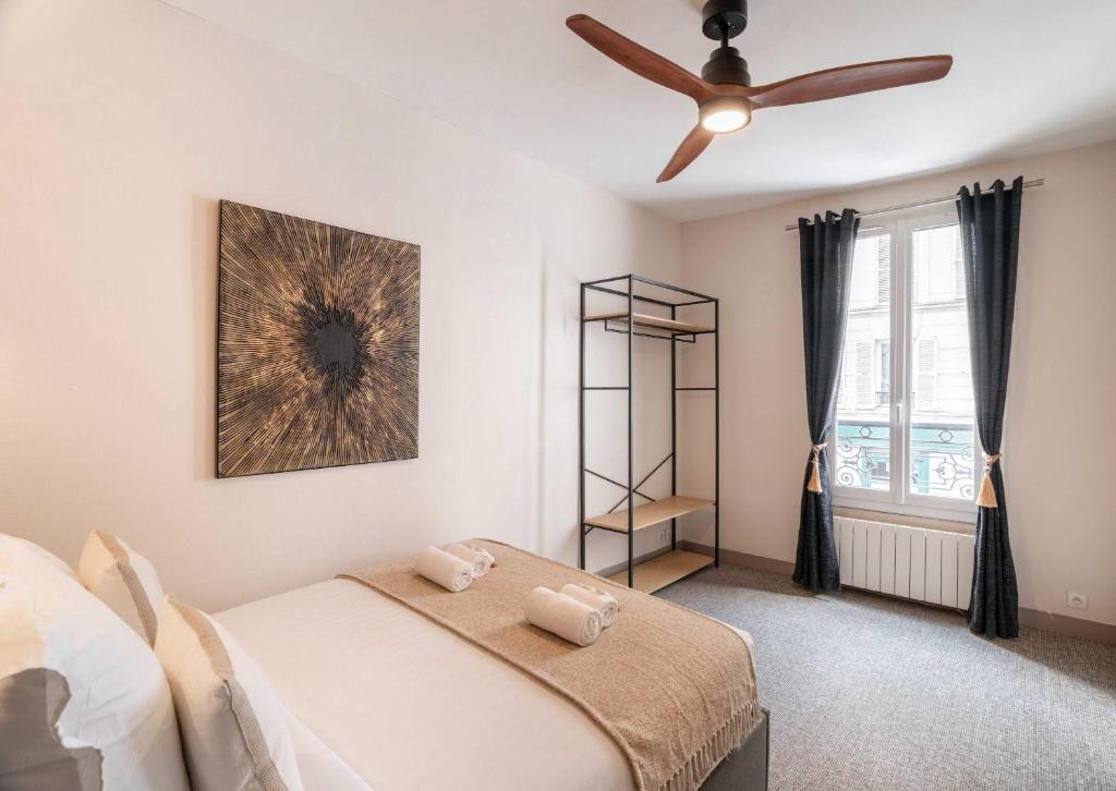 Posteľ alebo postele v izbe v ubytovaní Family Apartment in Paris