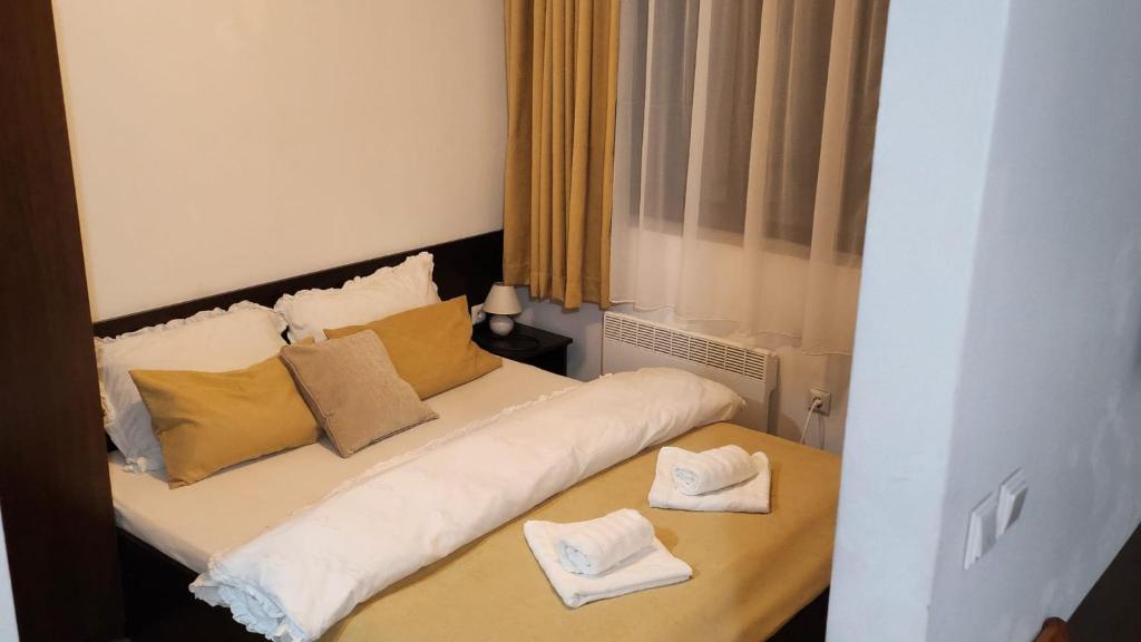 Giường trong phòng chung tại Guest Suite