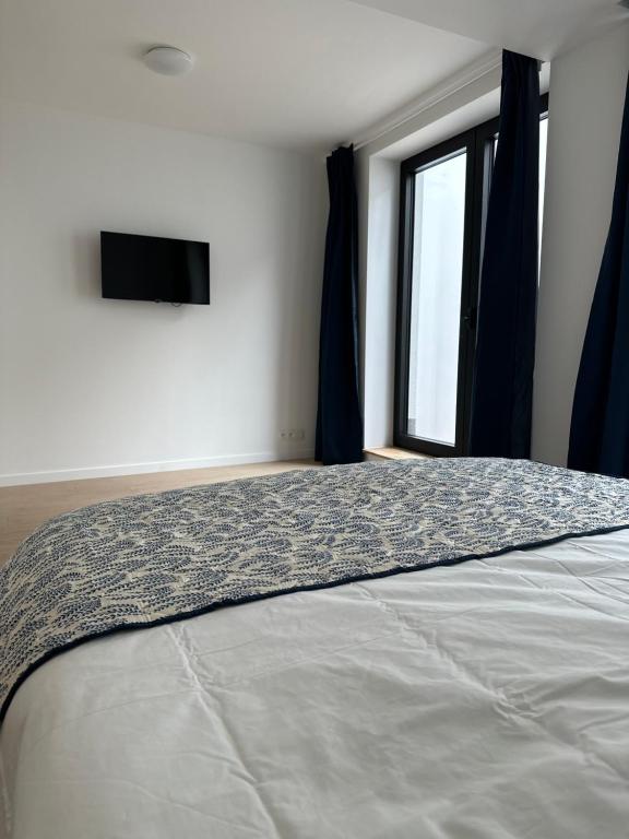 Postel nebo postele na pokoji v ubytování Room with ensuite and garden