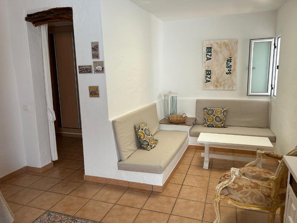 Posezení v ubytování Hostal Cala Moli