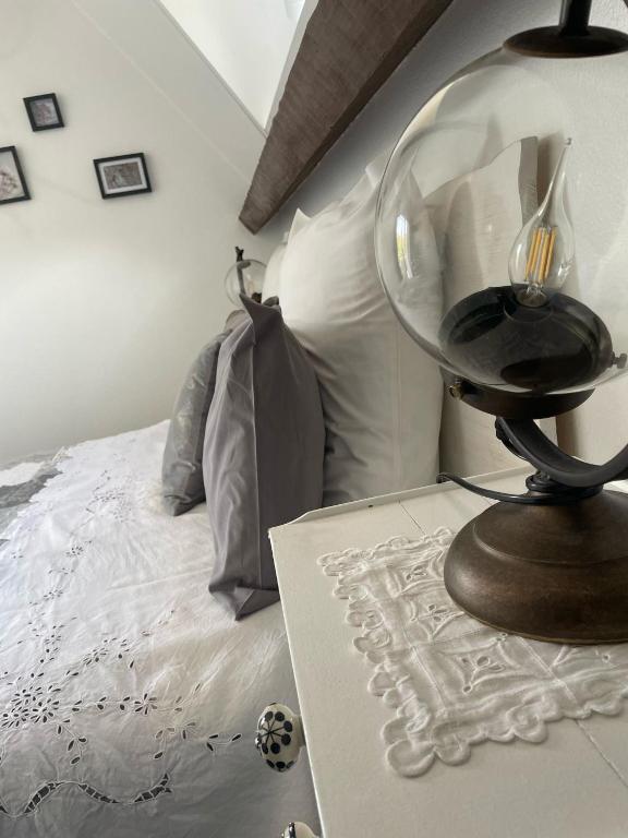 Postel nebo postele na pokoji v ubytování Chambres d'hotes Le relais globe trotteur