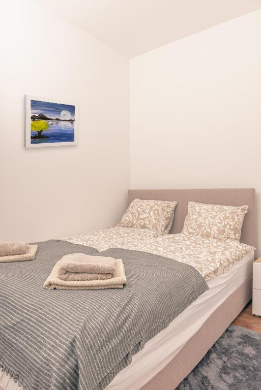 Letto o letti in una camera di L & S Apartmani