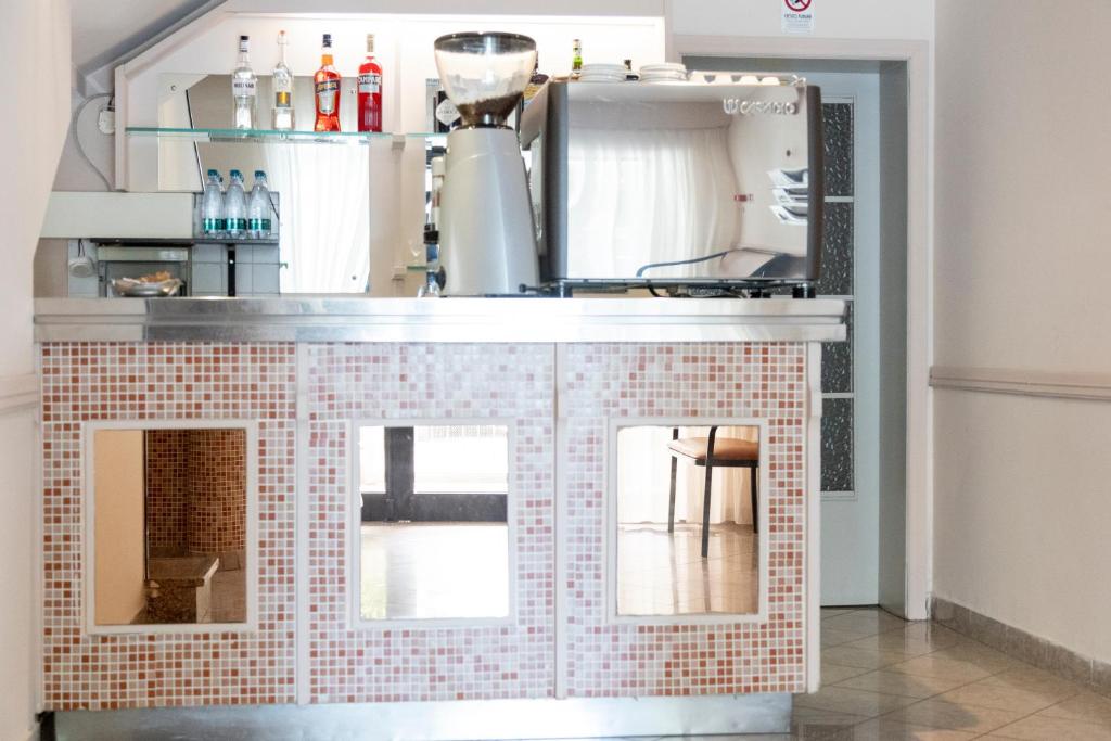 Kuchyň nebo kuchyňský kout v ubytování Hotel Laura Beach