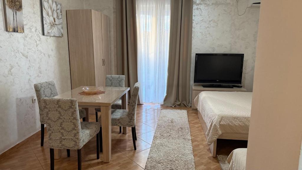 TV a/nebo společenská místnost v ubytování Oassis