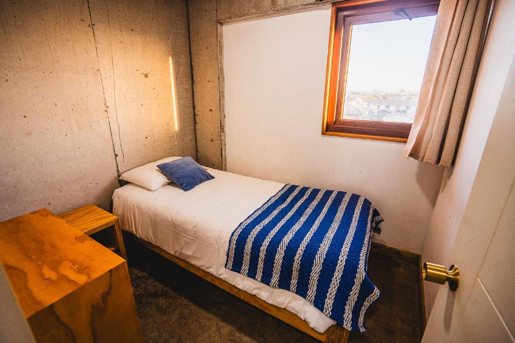 Letto o letti in una camera di Apart Hotel Kudun