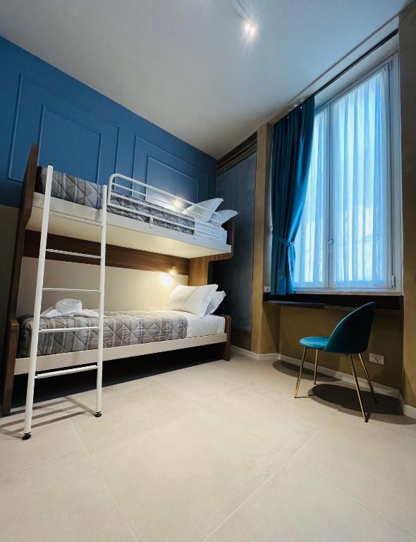 Postel nebo postele na pokoji v ubytování Natorè - camere di charme
