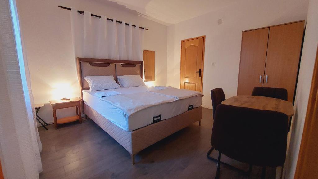 Postel nebo postele na pokoji v ubytování Guesthouse Mixe