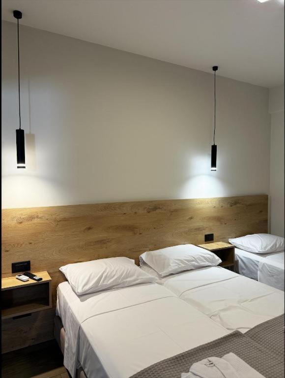 Postel nebo postele na pokoji v ubytování Lunar Hotel Modern Boutique