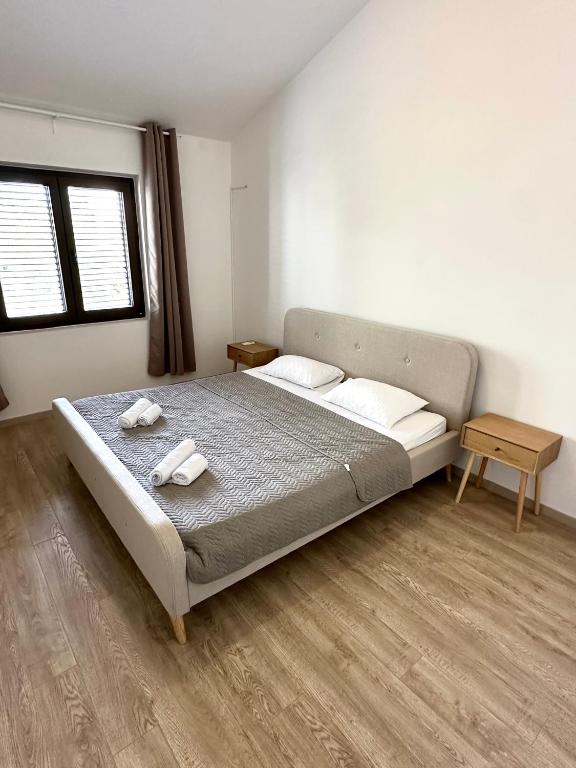 Postel nebo postele na pokoji v ubytování Guest house Kamelija
