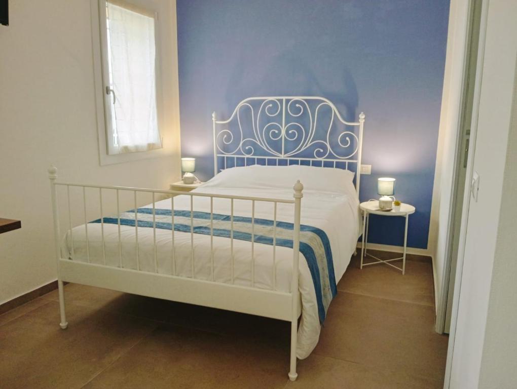 Postel nebo postele na pokoji v ubytování Modena Rooms