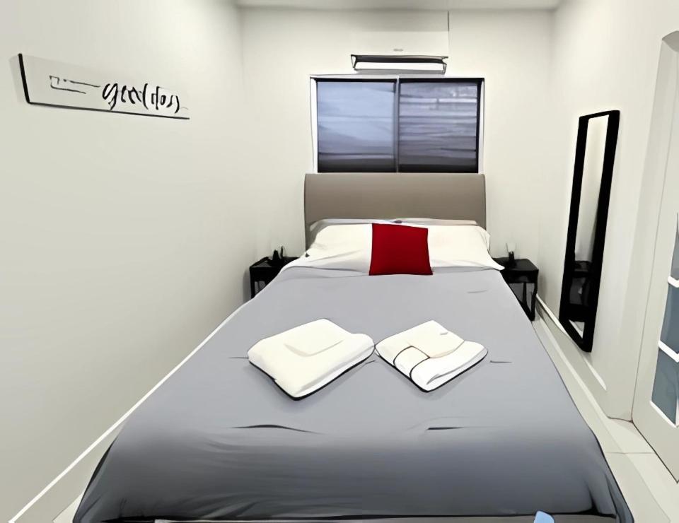 Ένα ή περισσότερα κρεβάτια σε δωμάτιο στο Pretty Private Room, near the Airport - Free parking - 01