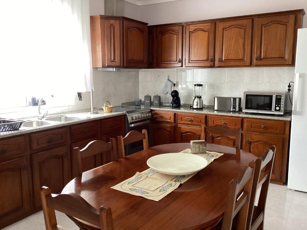Kuchyň nebo kuchyňský kout v ubytování Casa das Cales - Grande