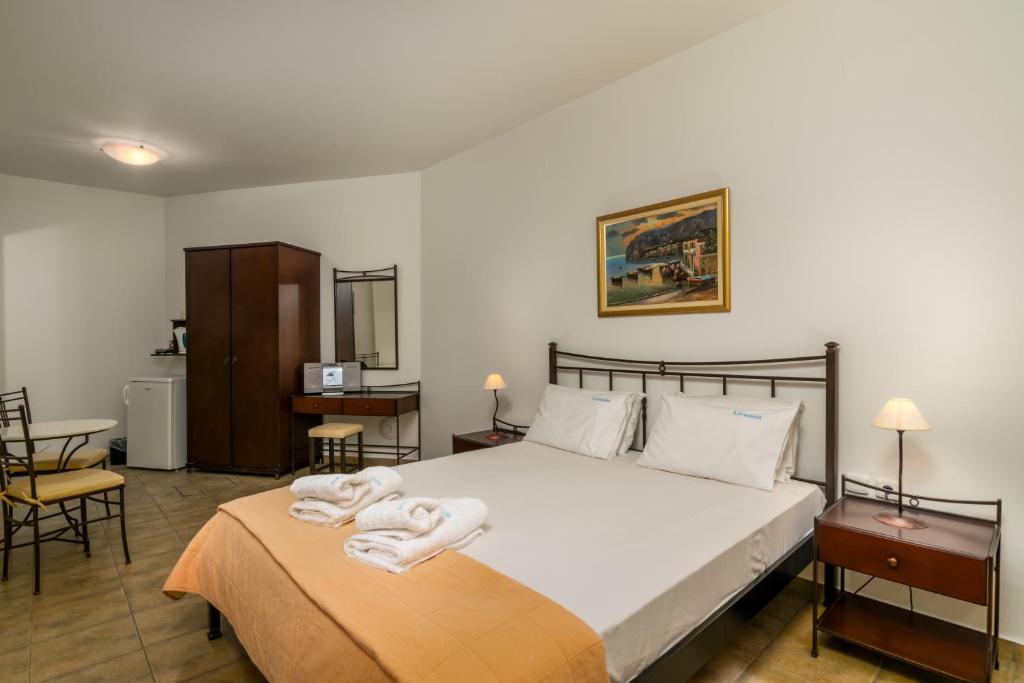 A bed or beds in a room at Livanios Studios