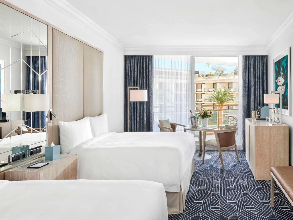 Postel nebo postele na pokoji v ubytování Fairmont Monte Carlo