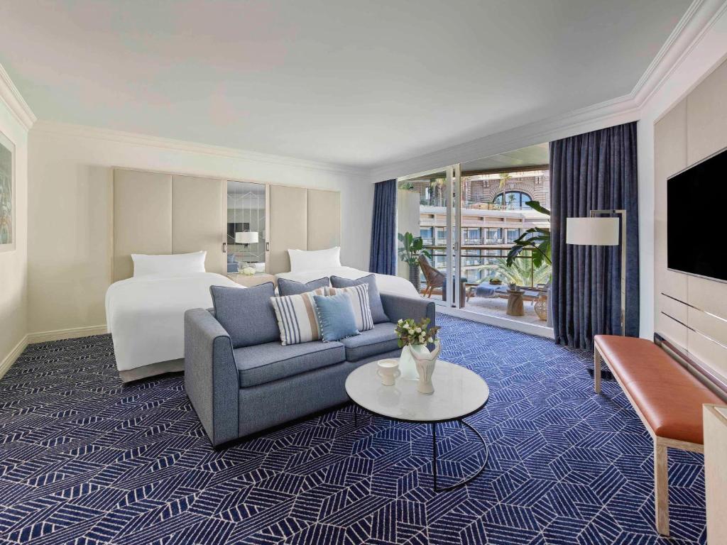 TV a/nebo společenská místnost v ubytování Fairmont Monte Carlo