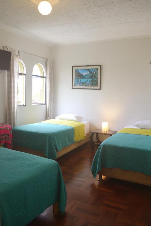 Postel nebo postele na pokoji v ubytování Casa Rodas