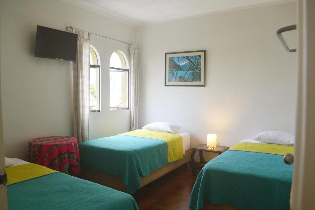 Postel nebo postele na pokoji v ubytování Casa Rodas