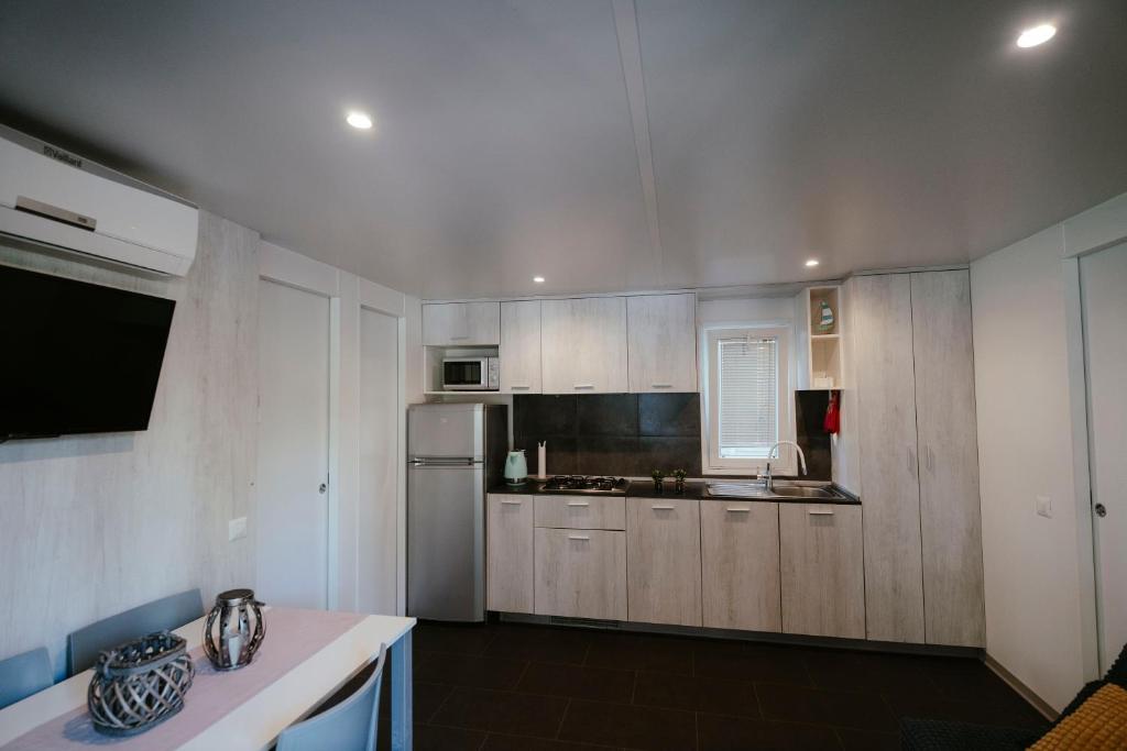 Kuchyň nebo kuchyňský kout v ubytování Mobile Home Amélie