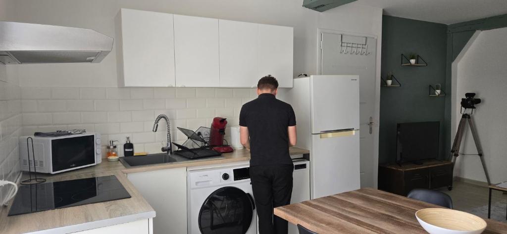 Kuchyň nebo kuchyňský kout v ubytování Le Cocon de Sens