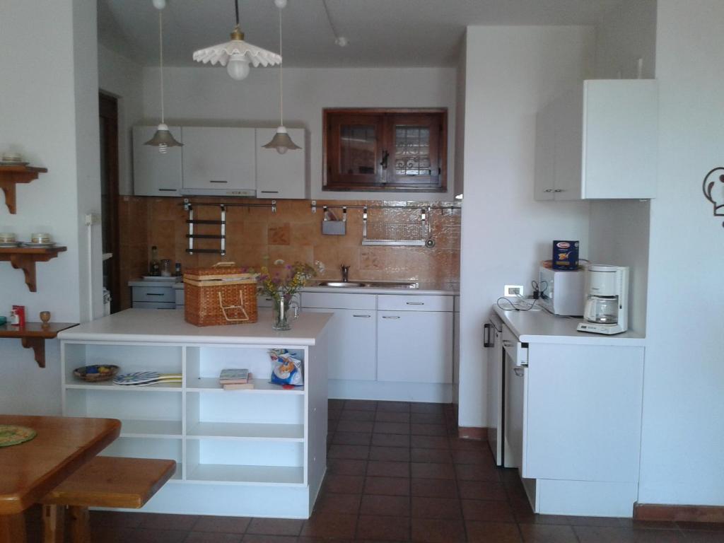 Kuchyň nebo kuchyňský kout v ubytování Villa Gardablick