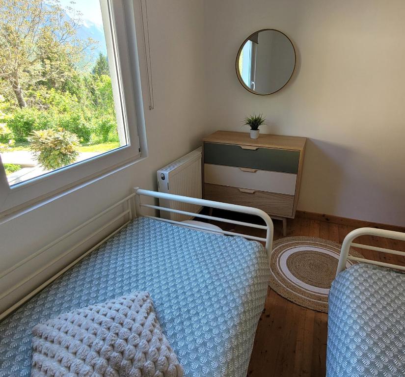 Ένα ή περισσότερα κρεβάτια σε δωμάτιο στο Chalet Julian