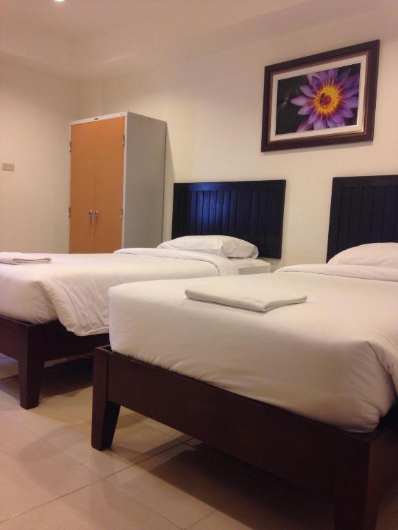 Una cama o camas en una habitación de Top Hostel (Top Mansion)
