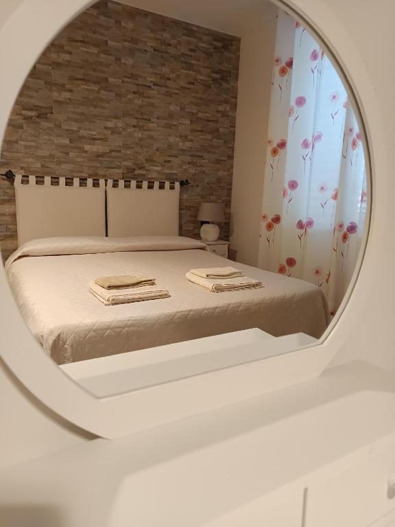 Postel nebo postele na pokoji v ubytování Domos Le Due Tuie