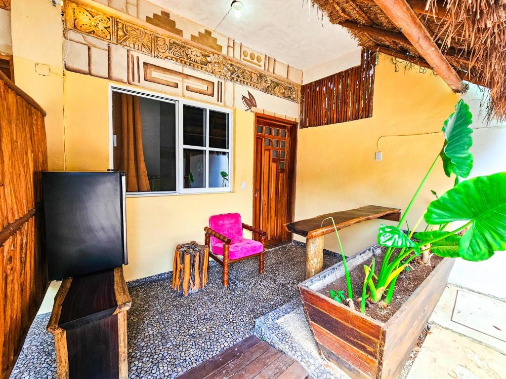 TV a/nebo společenská místnost v ubytování Maya Dreams Bacalar - Adults Only
