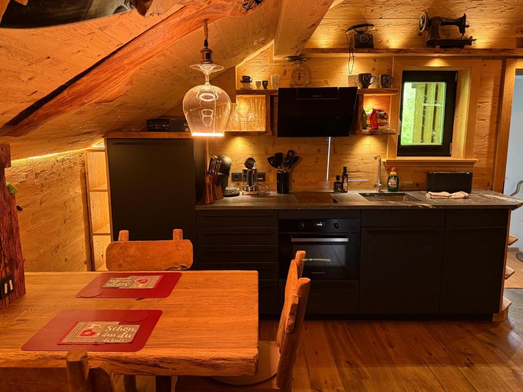 Kuchyň nebo kuchyňský kout v ubytování Bergromantik Ferienwohnung Charisma