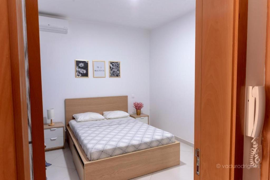 Postel nebo postele na pokoji v ubytování Urban Praia Maria - ApartHotel