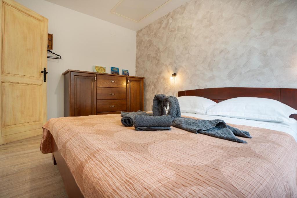 Postel nebo postele na pokoji v ubytování Villa a&a