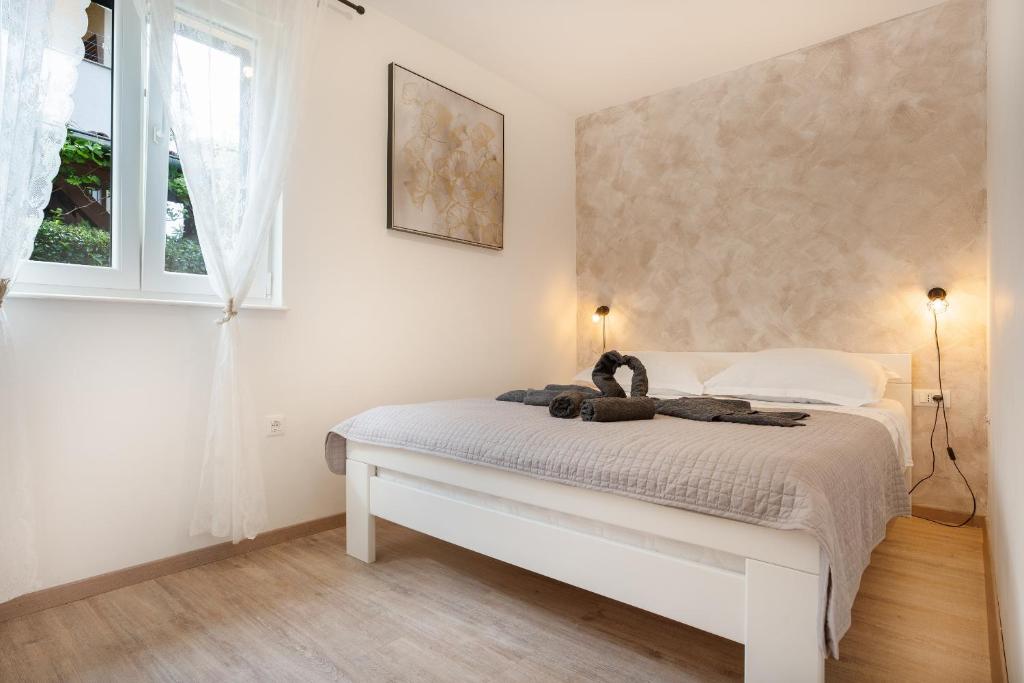 Postel nebo postele na pokoji v ubytování Villa a&a
