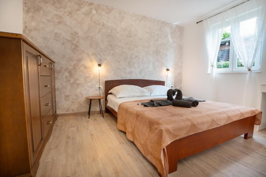 Postel nebo postele na pokoji v ubytování Villa a&a