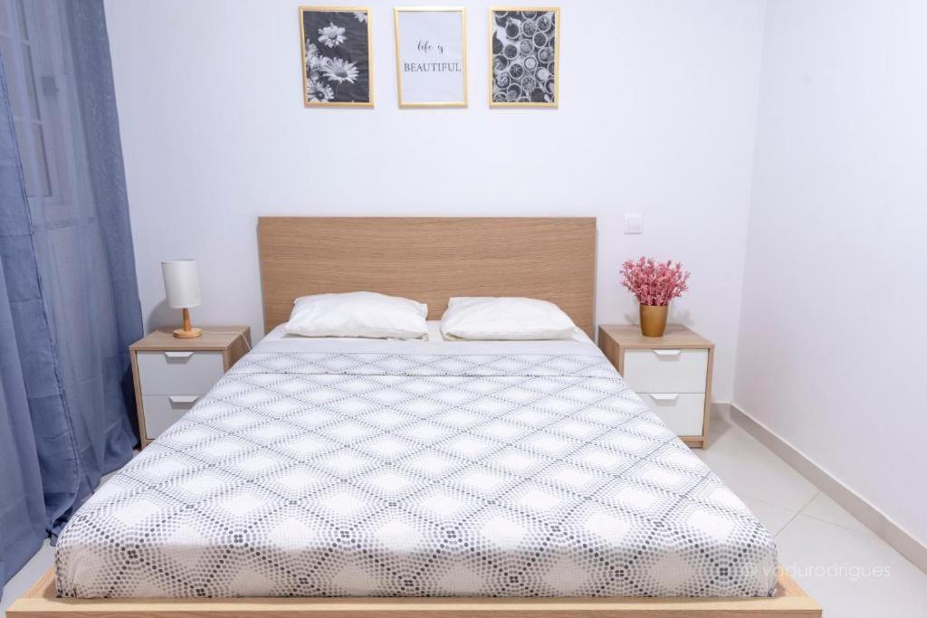 Postel nebo postele na pokoji v ubytování Urban Praia Maria - ApartHotel
