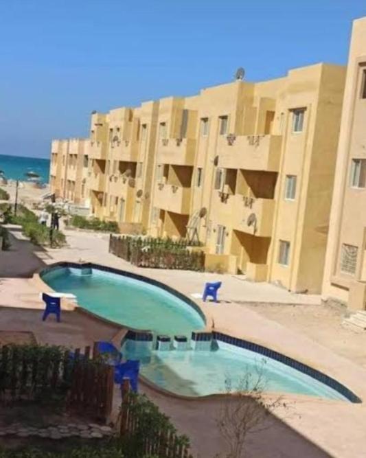 Bazén v ubytování قرية بلولاجون راس سدر شاليه فاخر للايجار for families only nebo v jeho okolí