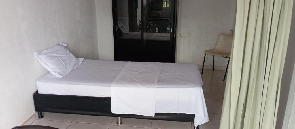 Postel nebo postele na pokoji v ubytování Casa Pariente