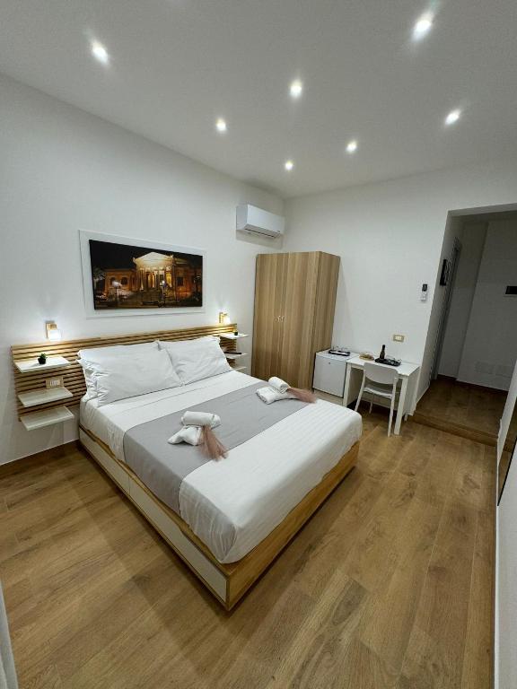 Postel nebo postele na pokoji v ubytování B&B Central Station