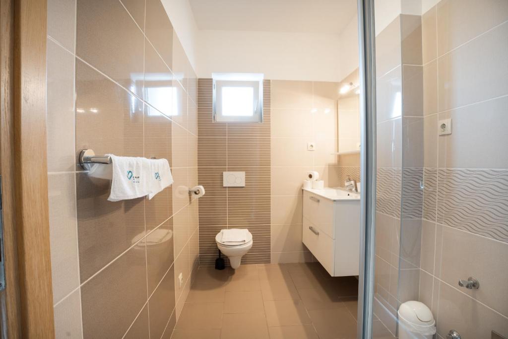 Koupelna v ubytování Apartments A&A