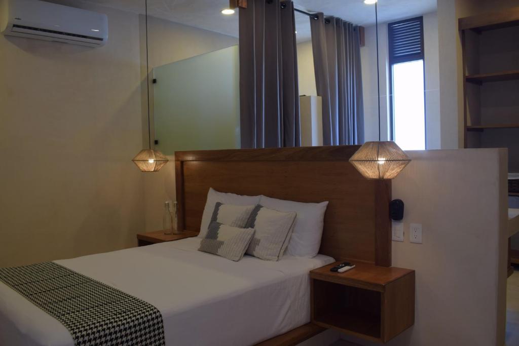 Postel nebo postele na pokoji v ubytování Joanza by ÓOL Hotels