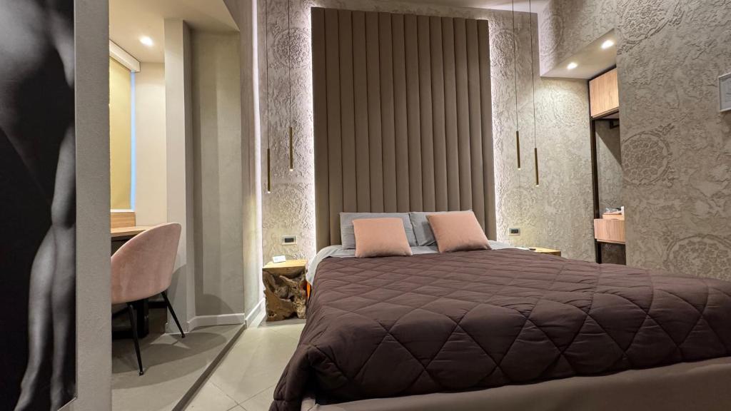 Posteľ alebo postele v izbe v ubytovaní Tropicana Room