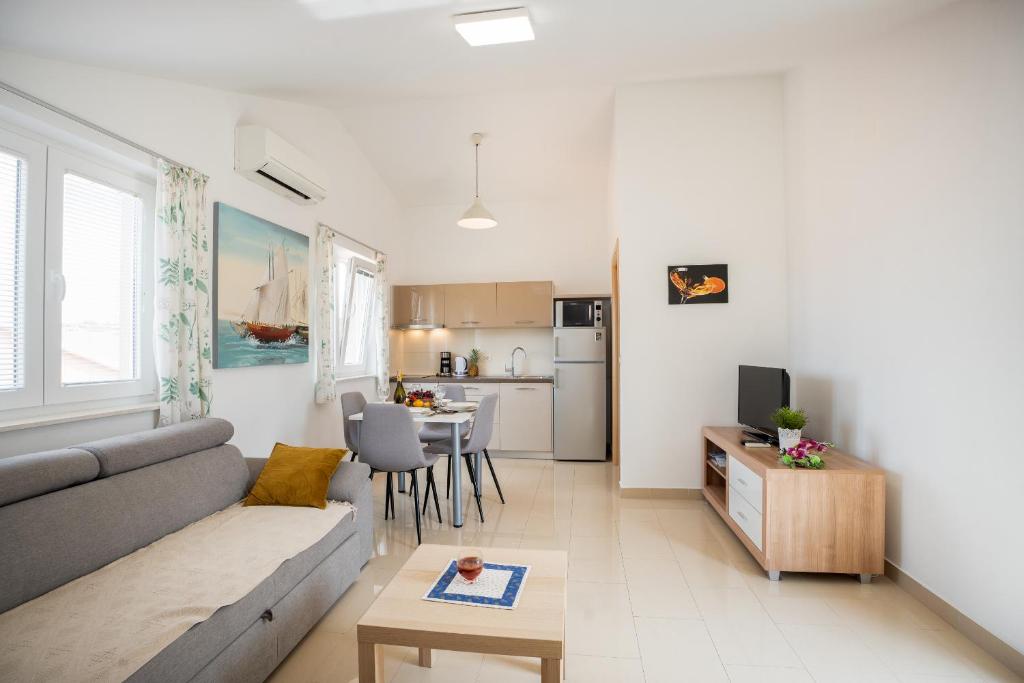 Kuchyň nebo kuchyňský kout v ubytování Apartments A&A