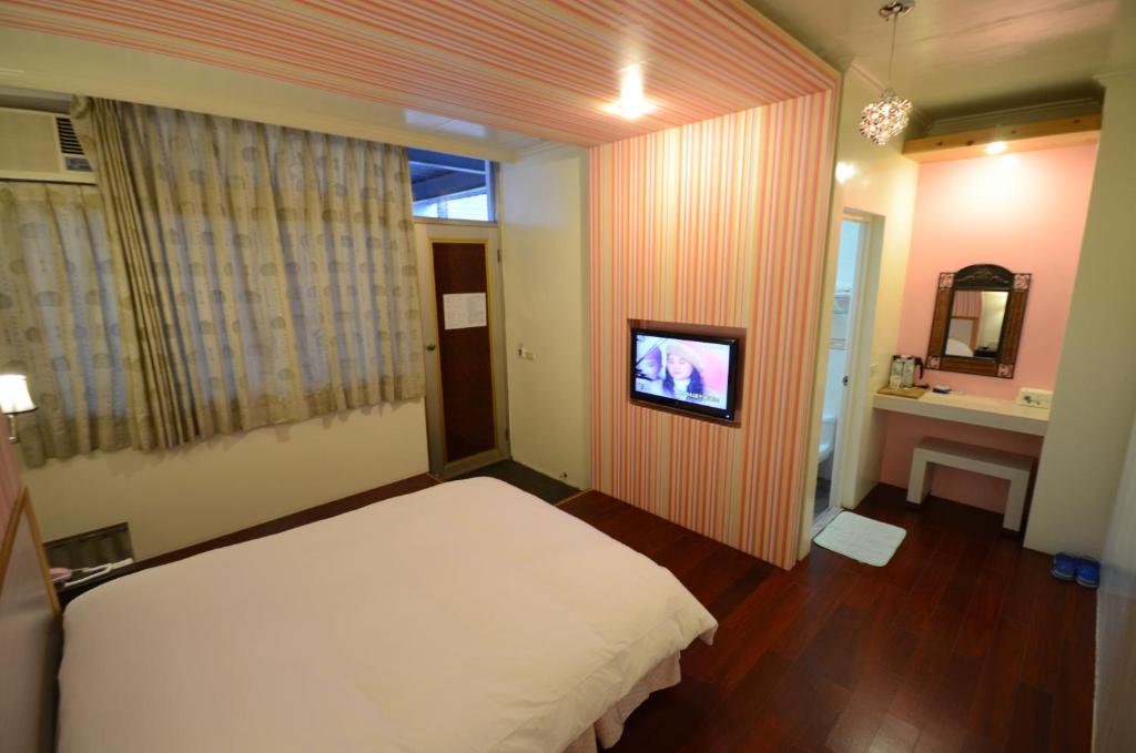TV a/nebo společenská místnost v ubytování Cocos Hot Spring Hotel