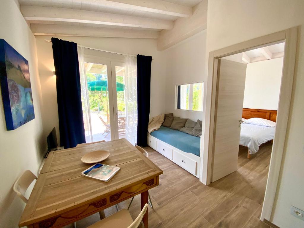 Кровать или кровати в номере Belvedere Residenza Mediterranea