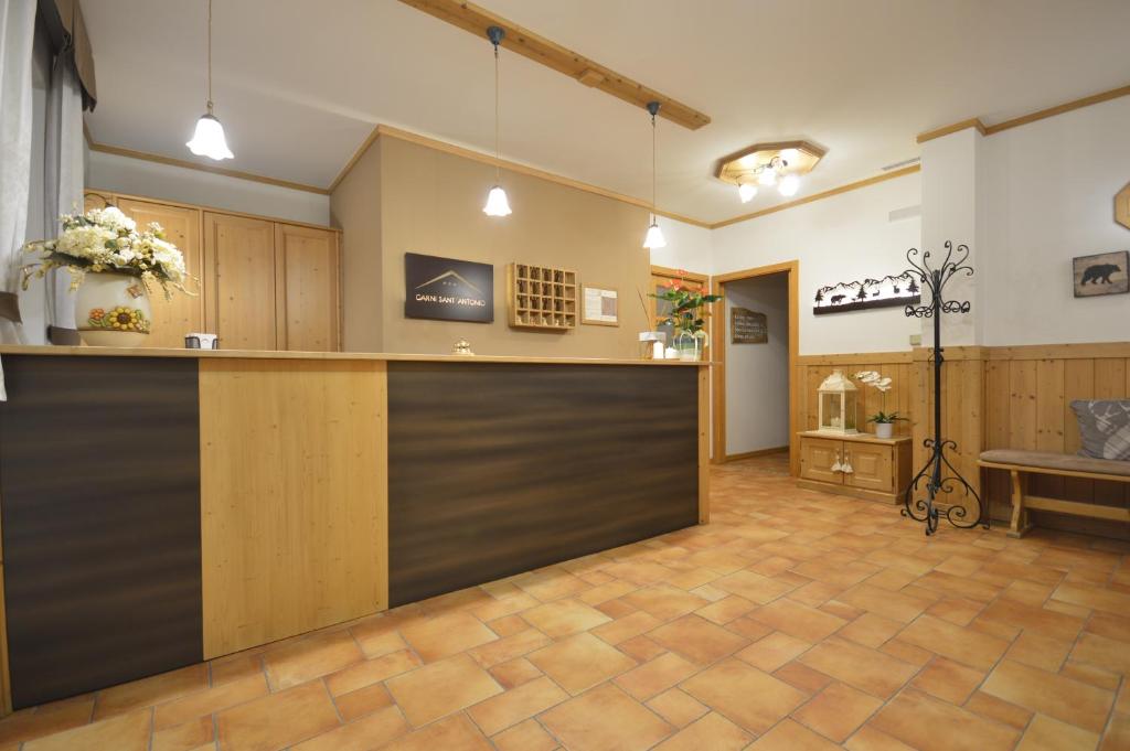 TV a/nebo společenská místnost v ubytování Hotel Garnì Sant'Antonio con Spa