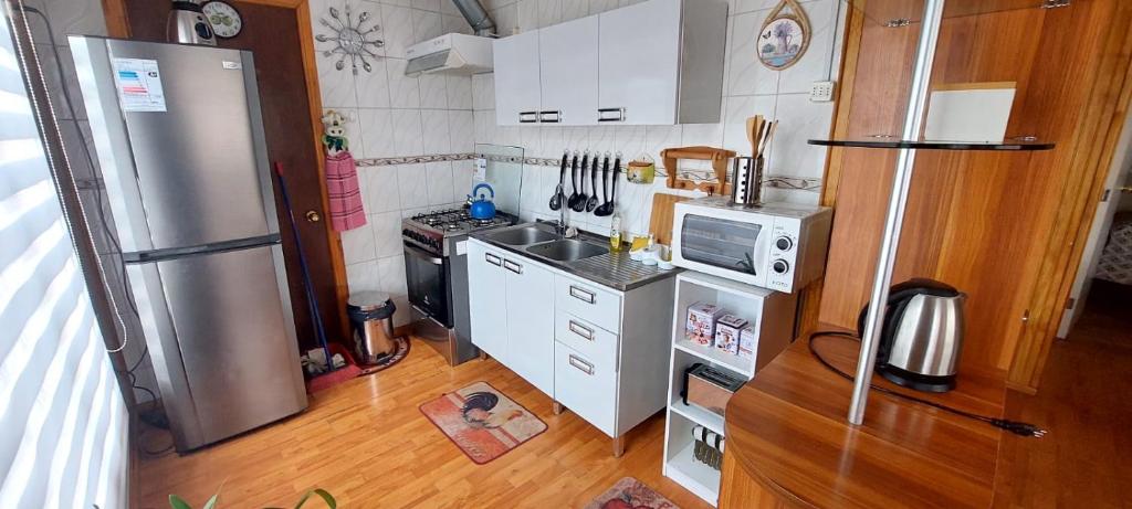Η κουζίνα ή μικρή κουζίνα στο Cabañas Bell Terra Ville
