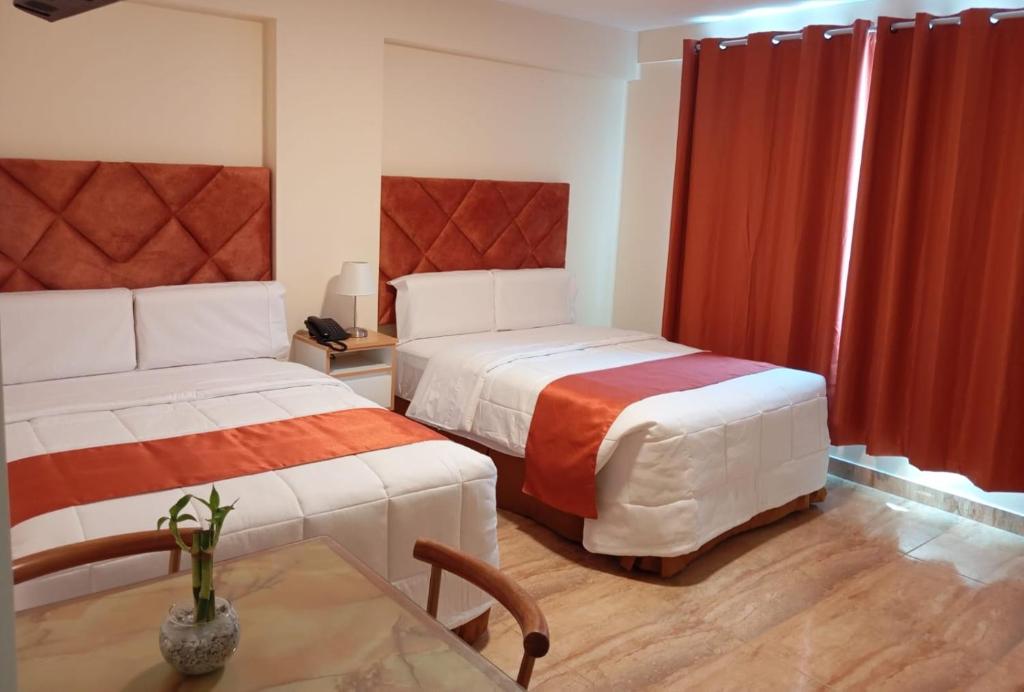 Postel nebo postele na pokoji v ubytování Hotel Soul Mate Inn