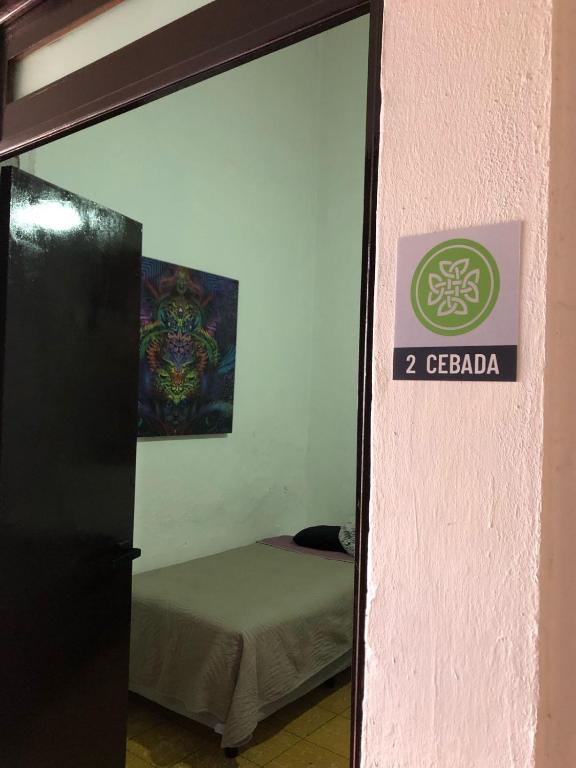 Postel nebo postele na pokoji v ubytování Hostal Centeno