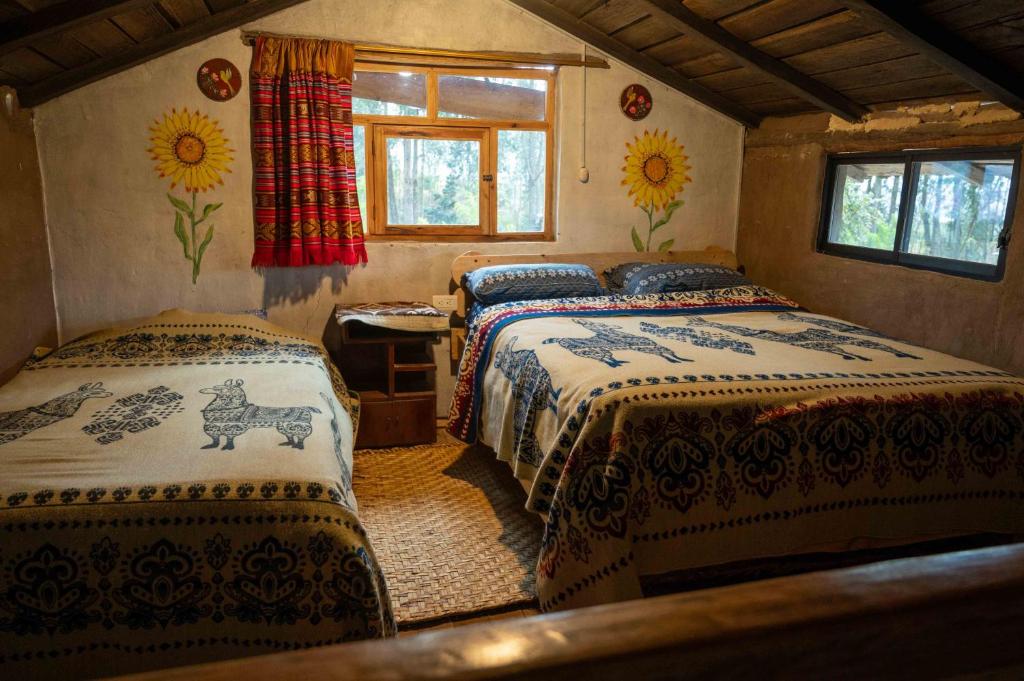 Postel nebo postele na pokoji v ubytování El Tio Hostal
