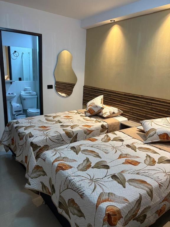 Postel nebo postele na pokoji v ubytování Hotel Lesus