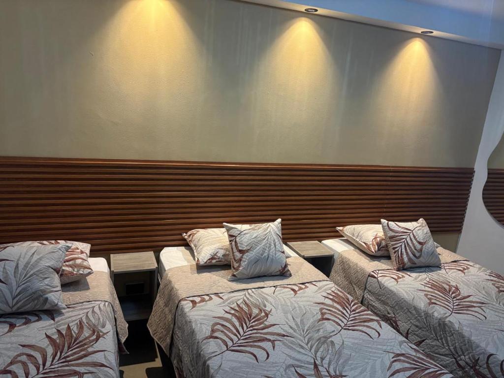 Postel nebo postele na pokoji v ubytování Hotel Lesus